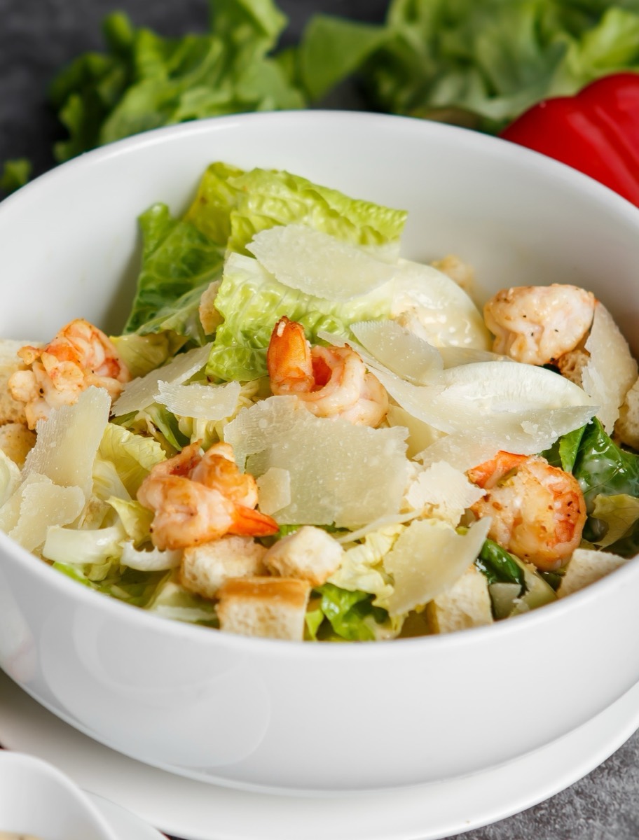 Caesar salad with shrimps, parmesan and croutons