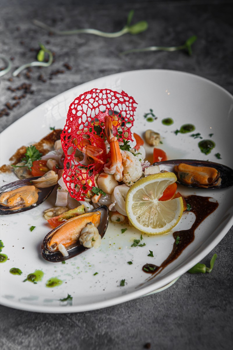 Italian seafood salad with shrimps, squid and mussels